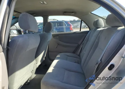 2003 Toyota Corolla Ce z USA, uszkodzony, nr VIN JTDBR32EX32008818